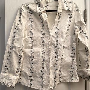 White and floral shirt with cuffed sleeves from Old Navy. .